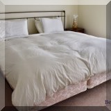 F38. King metal bed. Approx 50”h